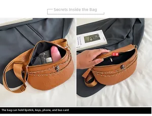 Detailansicht der braunen Satteltasche mit Stauraum für Handy und Make-up-Utensilien