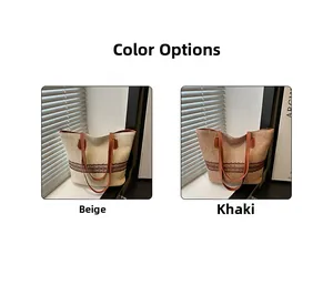 Detail view of woven straw tote bags in beige and khaki colors with decorative ribbons