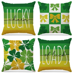 Set of 4 St. Patrick's Day green clover decorative pillow covers with lucky slogans