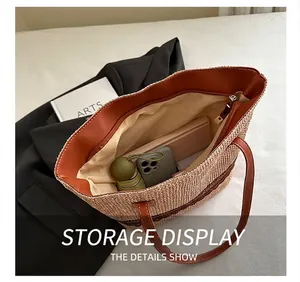 Interior view of large straw tote bag showing spacious capacity for daily essentials