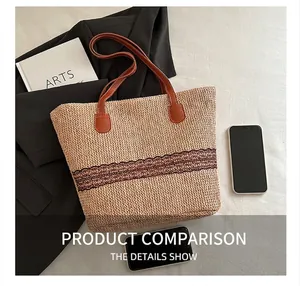 Flat lay of large woven tote bag with brown leather handles and crochet strip detail