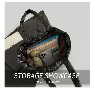 Top view showing the large interior capacity of this black quilted tote bag for essentials