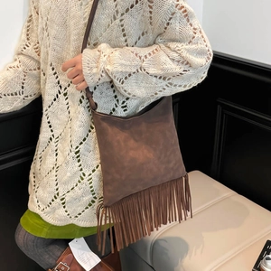 Brown fringe crossbody bag in brushed faux suede with retro bohemian tassel details