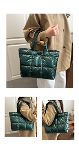 Detail view of metallic dark green quilted puffer tote bag with stitched square pattern