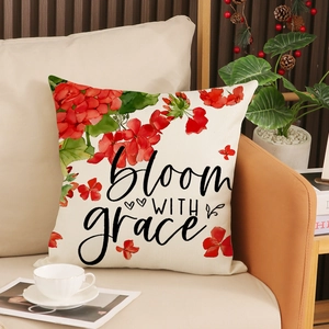 Linen decorative pillow cover with red floral bloom print and grace text on sofa