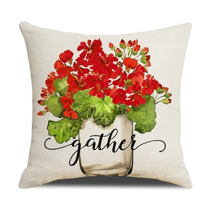 Linen pillow cover with red geraniums in white pot and gather text on white background