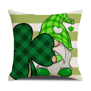 St. Patrick's Day gnome pillow case with shamrock print on green striped background