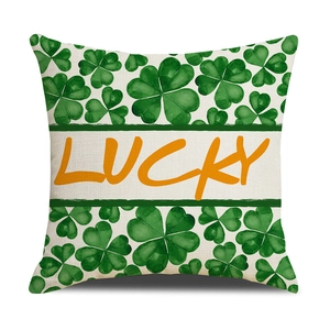 Square St. Patrick's Day pillow cover with green shamrocks and orange Lucky print