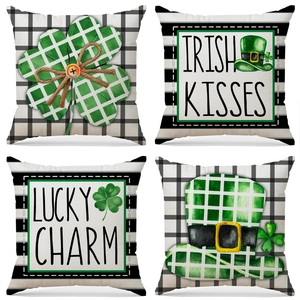 Set of four St. Patrick's Day pillow covers with clover and Irish lucky charm patterns