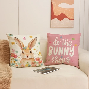 Easter bunny pillow covers in pink and beige linen with floral rabbit and text design