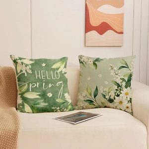 Floral spring cushion covers set featuring Hello Spring text and daisy linen texture