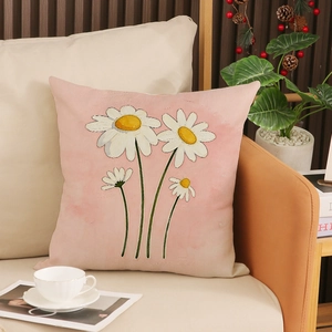 Funda de cojín de girasol acuarela rosa con estampado floral de margarita en sofá de lino