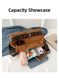Brown suede shoulder bag interior showing large capacity for tablet and daily items