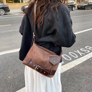 Retro brown suede large capacity shoulder bag shown on model for daily commuting