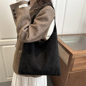 Retro black matte suede hobo bag with large capacity and minimalist shoulder strap design