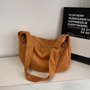 Minimalist large orange brown suede tote bag with adjustable strap and silver zipper