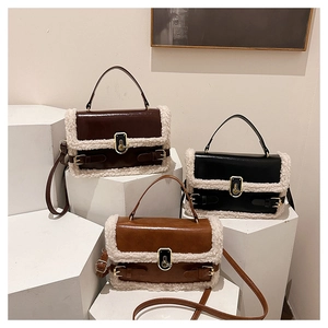 Chic winter crossbody bags in brown and black with plush faux fur trim and metal buckles