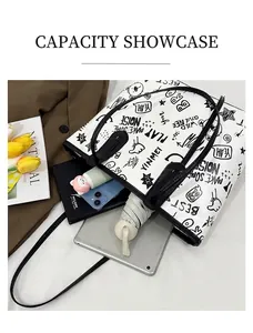 Interior view of spacious graffiti tote bag showing iPad, umbrella, and daily essentials