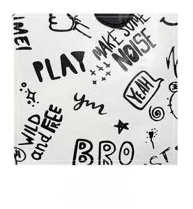 Close-up of graffiti print on white leather tote bag featuring street style patterns