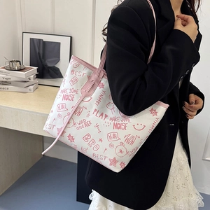Fashionable graffiti tote bag with pink cartoon bear print and stylish leather straps