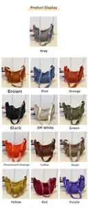 Grid display of crescent nylon crossbody bags in thirteen diverse vibrant colors
