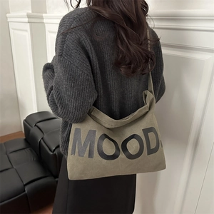 Minimalist canvas messenger bag with MOOD letter print and wide strap for casual wear