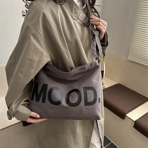 Brown canvas messenger bag with MOOD. text, large capacity trendy crossbody style for women