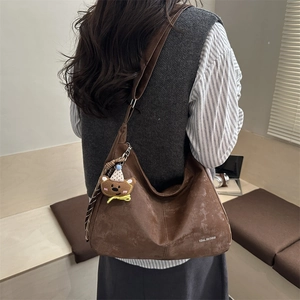 Retro dark brown large crossbody bag in matte leather with a cute bear pendant