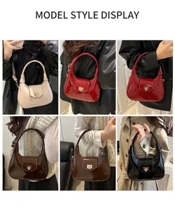 Detail view of the crescent shoulder bag in six colors with glossy patent finish