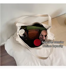 Interior view of large white leather tote bag showing spacious storage for daily essentials
