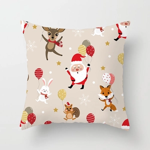 Detail of Christmas pillowcase with festive reindeer, Santa, and animal patterns on beige