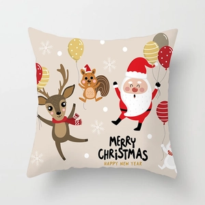 Detail of Christmas pillowcase with festive cartoon prints and holiday greetings