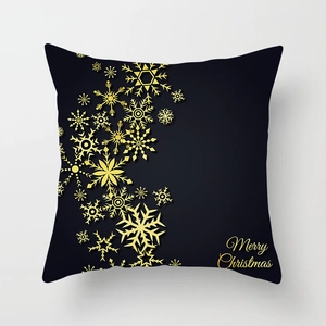 Eleganter Weihnachts-Kissenbezug mit goldenen Schneeflocken und Text auf schwarzem Stoff