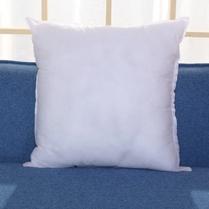 White square cushion insert with PP cotton filling on a blue fabric sofa