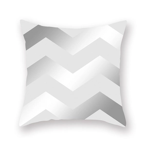 Detailed view of silver grey geometric chevron wave pattern on a peach skin pillow case