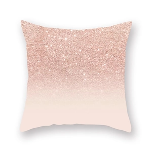 Detail of rose gold sequin print and pink gradient texture on square pillow cover