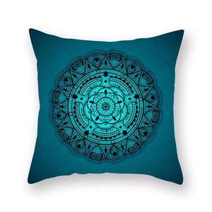 Square teal mandala throw pillow cover with bohemian geometric patterns on white background