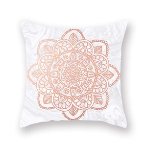 Macro detail of rose gold mandala pattern on white marble velvet throw pillow case