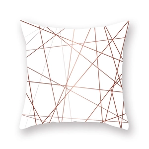 Macro view of rose gold geometric lines on white polyester pillowcase fabric texture
