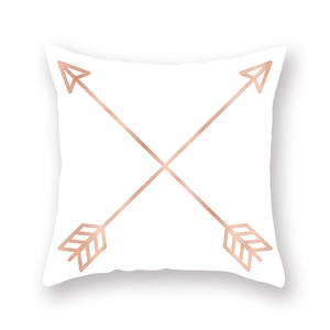 Detail of white velvet pillowcase with metallic rose gold double arrow print and hidden zipper