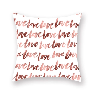 Rose gold love script printed square throw pillow cover on white background
