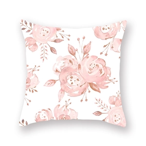 Detail showing soft watercolor rose pattern with sparkling rose gold glitter on pillowcase