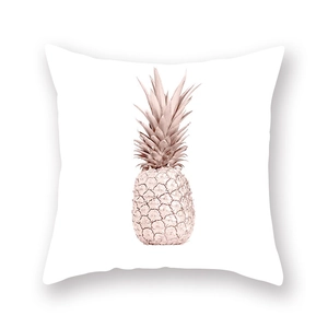 Detail view of white pillowcase featuring a decorative rose gold pineapple pattern
