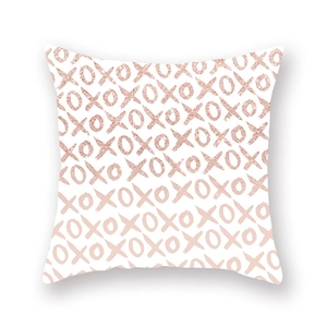 Detail of XOXO square pillowcase with rose gold glitter texture and pink letters