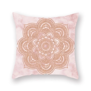 Detail of rose gold mandala geometric pattern on pink marble texture cushion cover