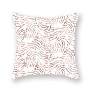 Detail of rose gold leaf pattern on white peach skin fabric square throw pillow case
