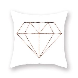 Close-up of white square pillowcase with metallic rose gold geometric diamond pattern