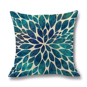 Linen pillow cover with radial geometric ocean waves print in blue and teal tones