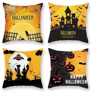 Set of four Halloween pumpkin castle pillow covers in vibrant orange and black peach skin