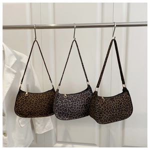 Detail showing various leopard print hobo bags in dark brown and grey-purple tones